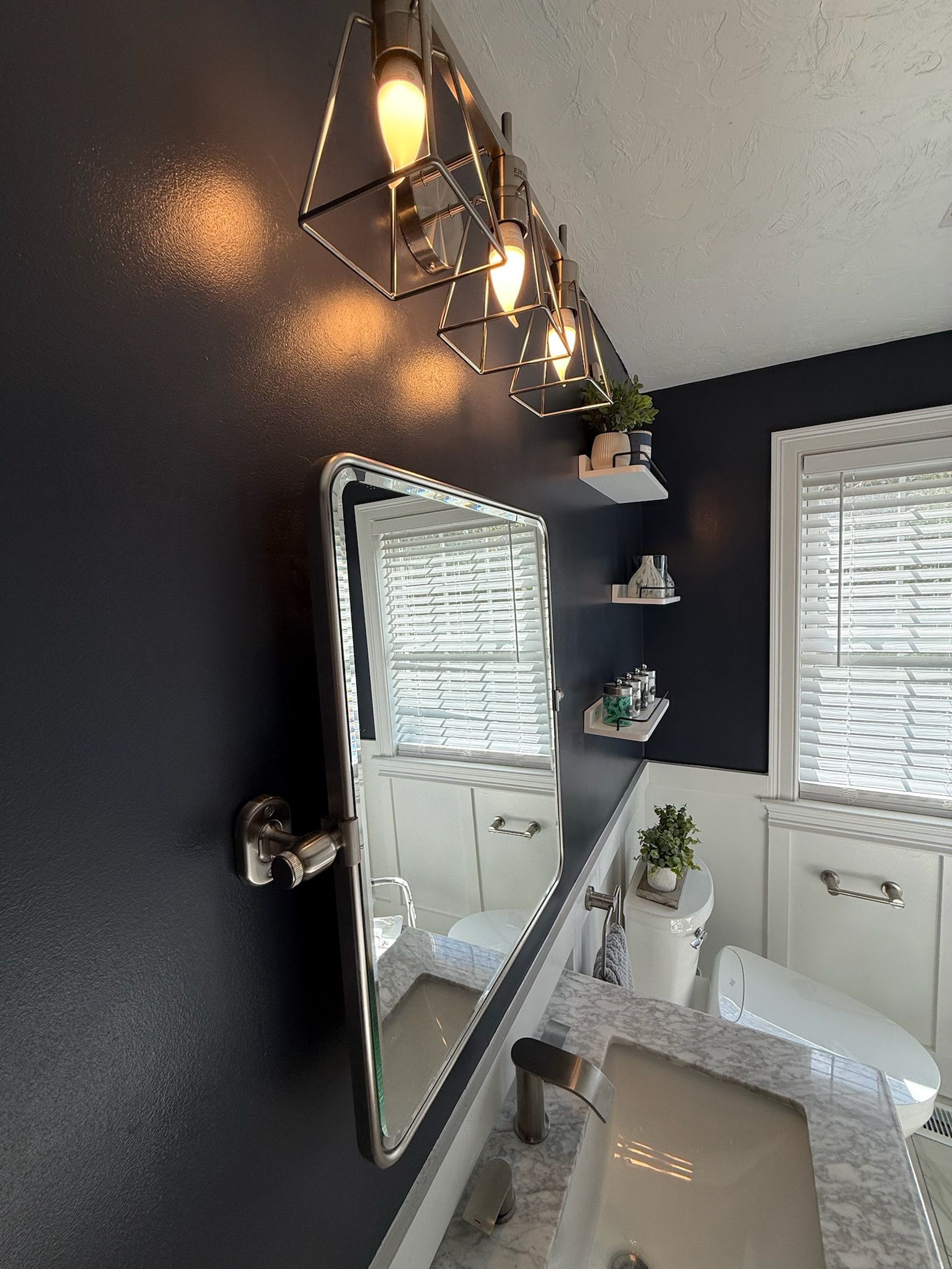 Tewksbury bathroom — geometric pendant lights and tilting mirror